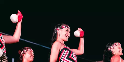 Māori women performing poi dance