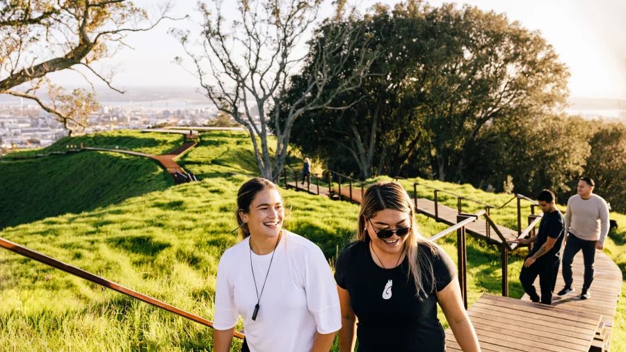Group walking on Mount Eden boardwalk in Auckland