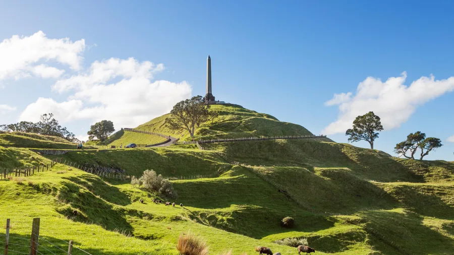 One Tree Hill summit with obelisk monument overlooking Auckland city and green parkland