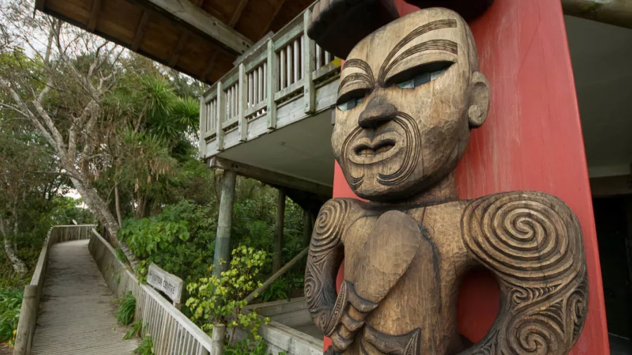 Traditional Māori carving at Arataki Visitor Centre in the Waitākere Ranges