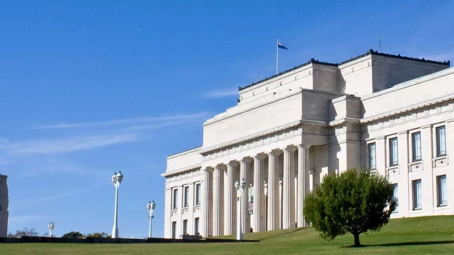 Exterior of Auckland War Memorial Museum with blue sky at Auckland Domain