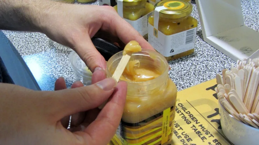 Display of local honey products and live bee exhibit at Huka Honey Centre in Taupo