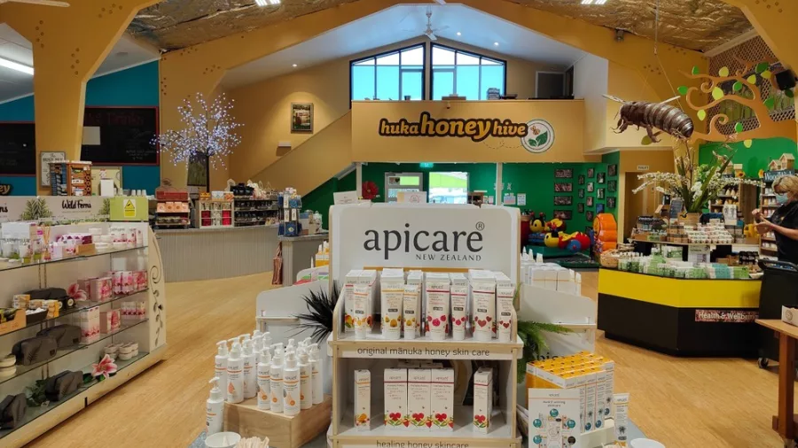 Display of artisan honey products and beehive exhibits at Huka Honey Hive in Taupō, New Zealand