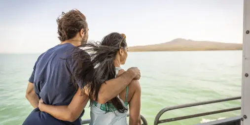 Couple travelling by ferry to Rangitoto Island from Auckland with Fullers360