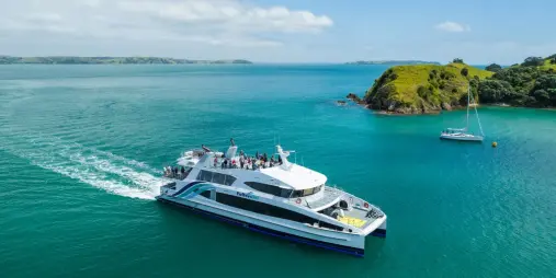 Fullers360 ferry cruising through Matiatia Bay on Waiheke Island