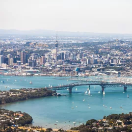 Auckland city and Harbour Bridge with sailing boats