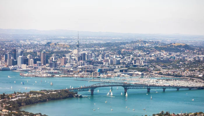 Auckland city and Harbour Bridge with sailing boats