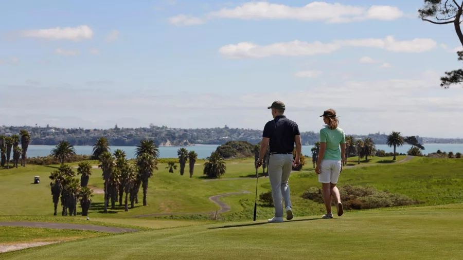 Couple playing golf at Rydges Formosa Golf Resort