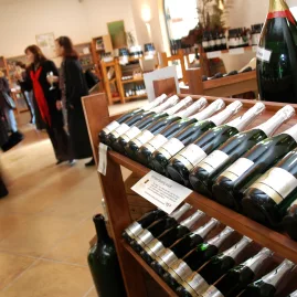 Bottles of sparkling wine on display at Auckland winery cellar door