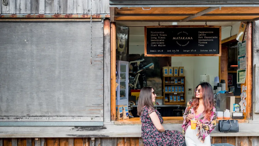 Women at cafe in Matakana Farmers Market