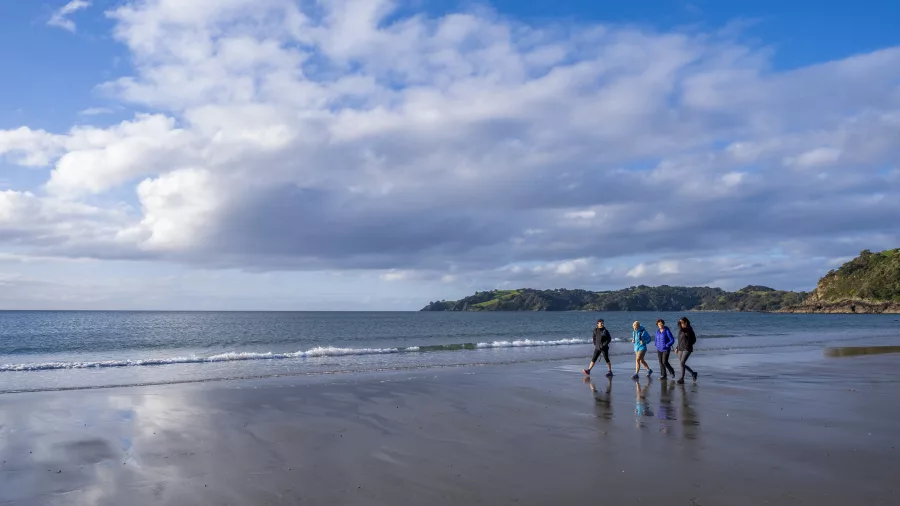 Person walking through natural surroundings during a Private Freedom Backyard retreat experience