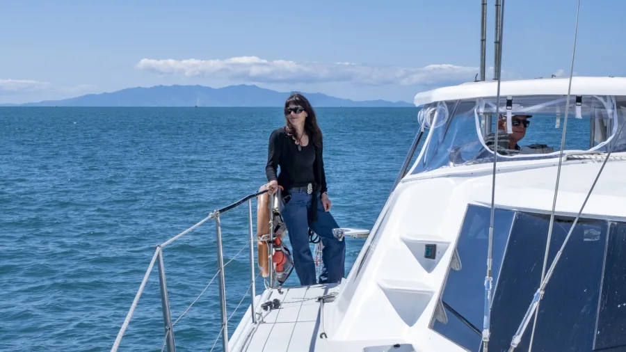 Relaxing moment aboard a Waihiking Island yachting vessel during a scenic sailing trip