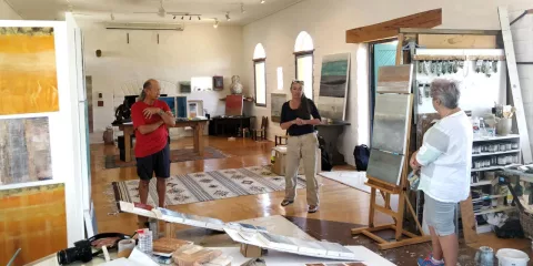 Interior view of the Lewenz Studio on Waiheke Island with original artworks on display