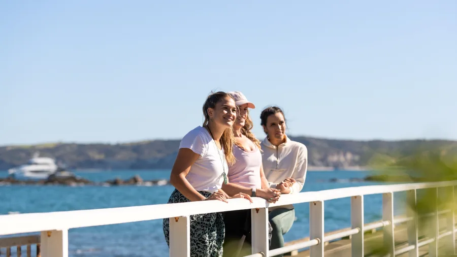 Women on Tiritiri Matangi Island wharf