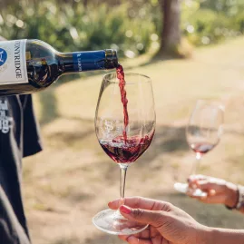 Red wine poured at Stonyridge Vineyard, Waiheke Island