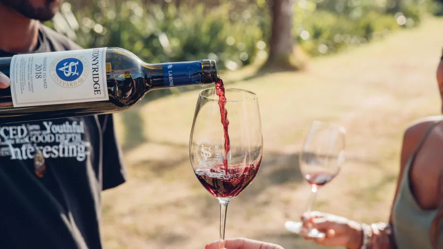 Red wine poured at Stonyridge Vineyard, Waiheke Island