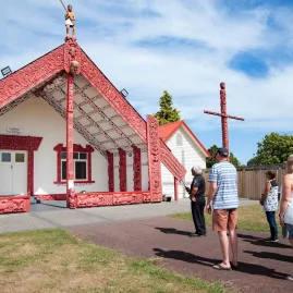Visitors arriving at a marae as part of the guided Kahukiwi cultural experience in Rotorua.