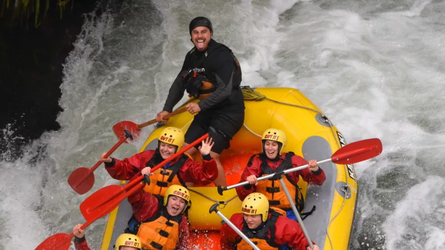 Rafters descending Tutea Falls in the Ōkere Gorge on a Kaituna River adventure with Kaitiaki.