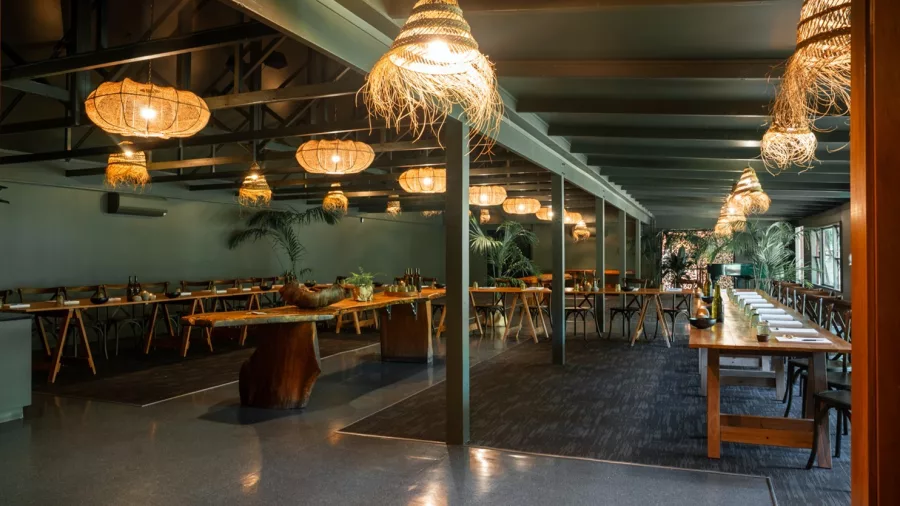 Spacious and beautifully lit indoor dining area set for a Te Pā Tū gathering