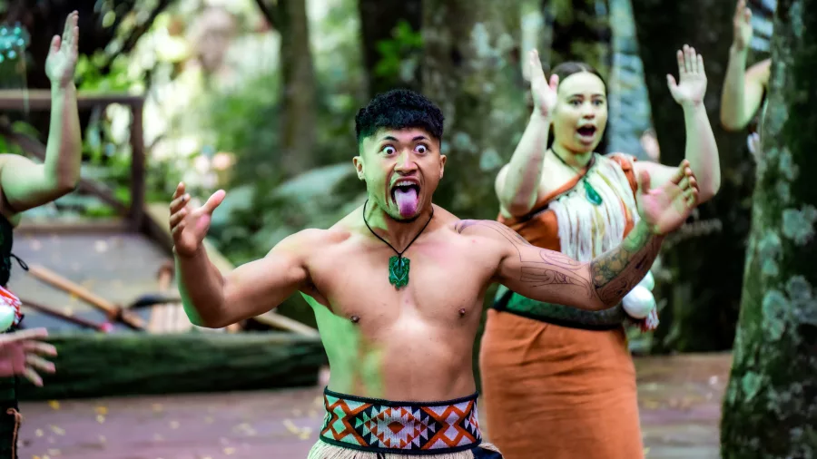 Energetic haka performance by Māori warriors during a cultural evening at Te Pā Tū