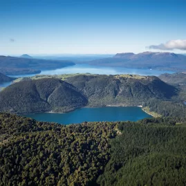 Clear aerial shot showcasing several crater lakes during a Rotorua scenic flight with Volcanic Air