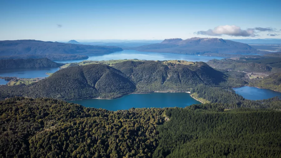 Clear aerial shot showcasing several crater lakes during a Rotorua scenic flight with Volcanic Air