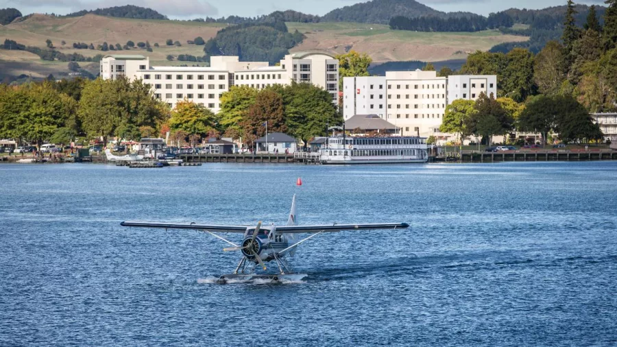 Volcanic Air floatplane departing the Lake Rotorua jetty for a scenic flight