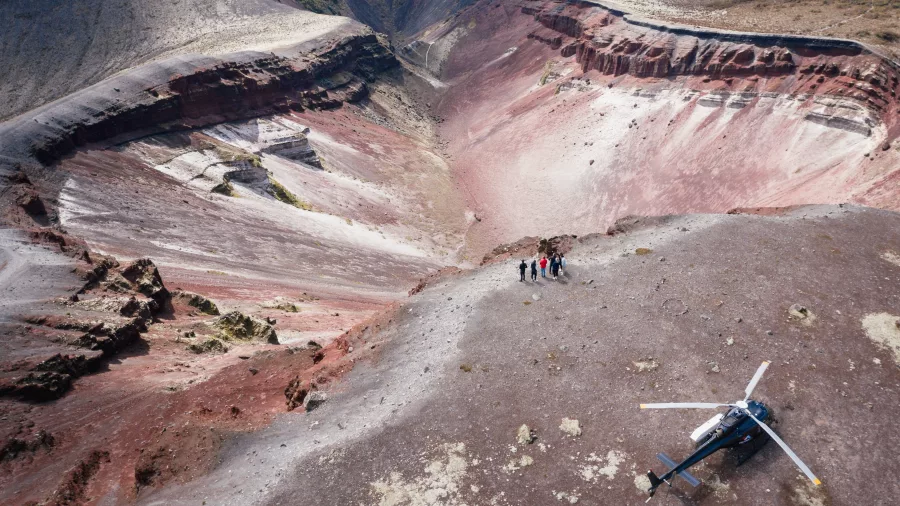 Helicopter landed on the edge of Mt Tarawera’s crater with a group of hikers