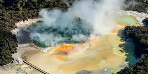 Steam rising from the colourful Champagne Pool at Wai-O-Tapu near Rotorua