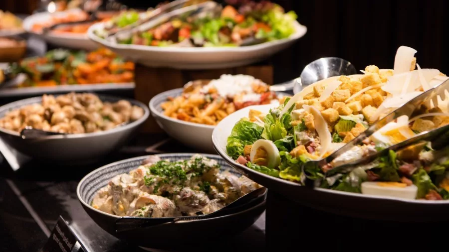 Fresh salads and sides as part of a traditional Māori hāngi buffet at Te Puia, Rotorua