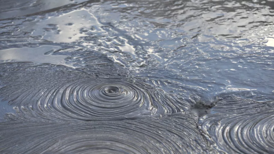 Bubbling Ngāmōkaiakoko Mud Pool at Te Puia in Rotorua, New Zealand