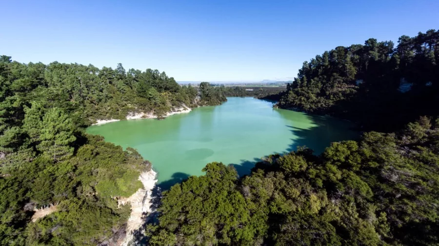 Scenic view of Lake Ngakoro surrounded by geothermal features at Wai-O-Tapu