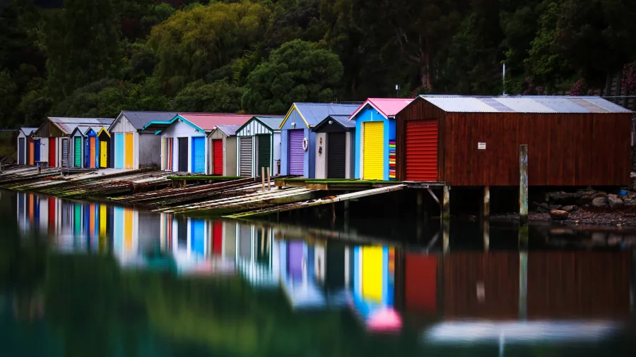 Colourful boat sheds on Akaroa Harbour