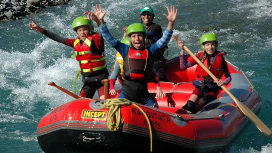 Family enjoying a rafting adventure on the Rangitata River near Ashburton