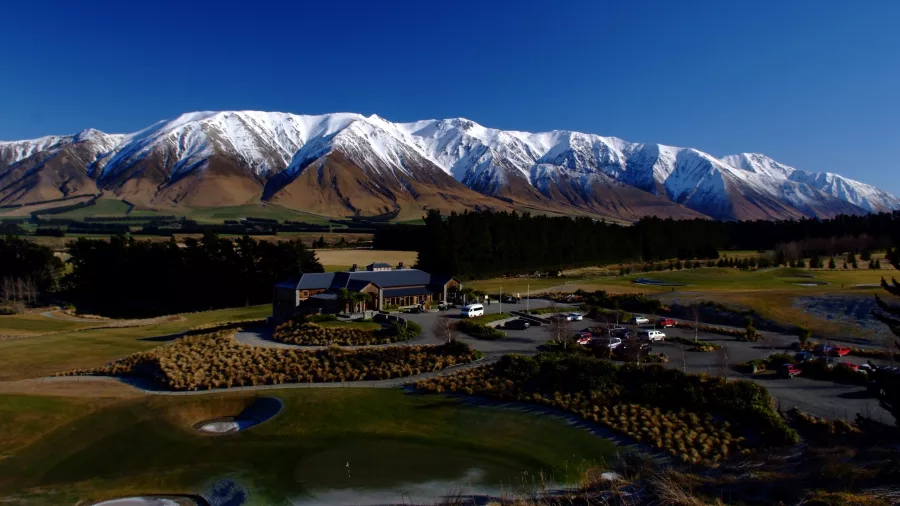 Snow-capped mountains behind Terrace Downs Resort in Methven during winter