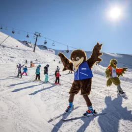 Ski mascots entertaining children on Mt Hutt slopes