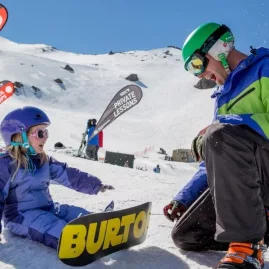 Child learning to snowboard at Mt Hutt ski field