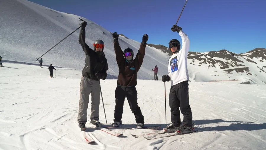 Group of friends skiing at Mt Hutt ski field near Methven
