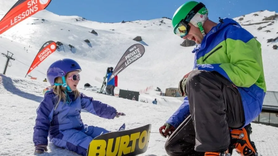 Child learning to snowboard at Mt Hutt ski field