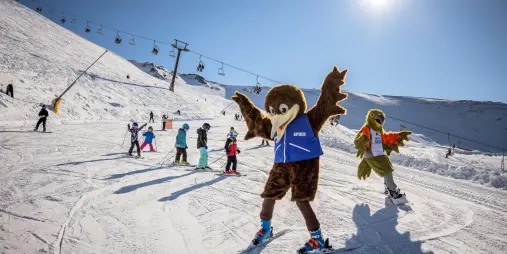 Ski mascots entertaining children on Mt Hutt slopes