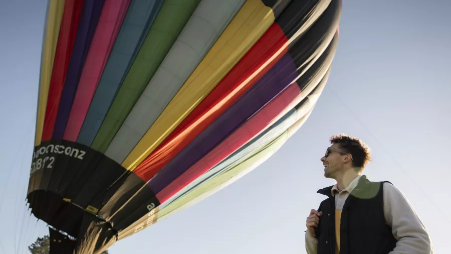 Man watching hot air balloon inflating in Methven Canterbury