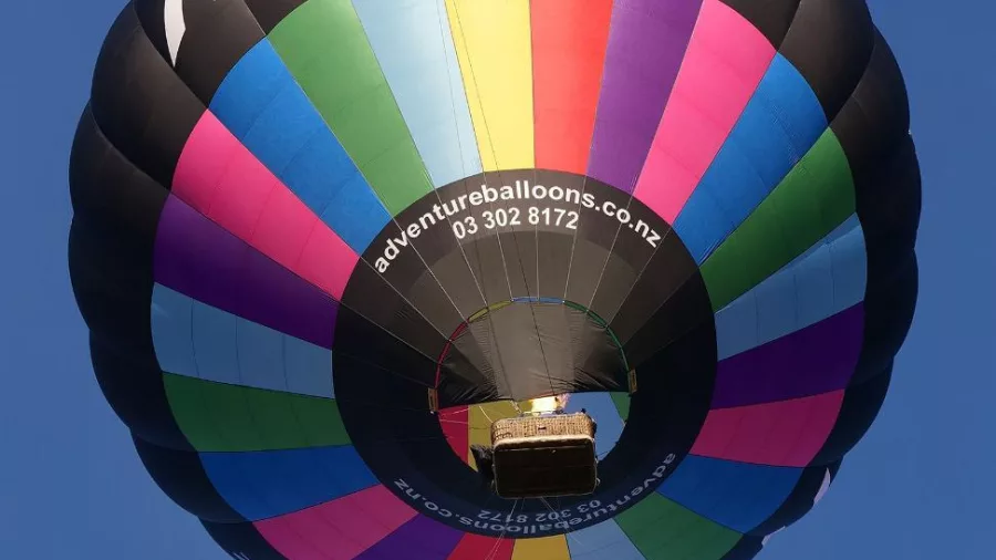 Rainbow hot air balloon over Wanaka with Adventure Balloons NZ