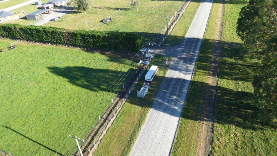 Hot air balloon shadow over rural Methven road