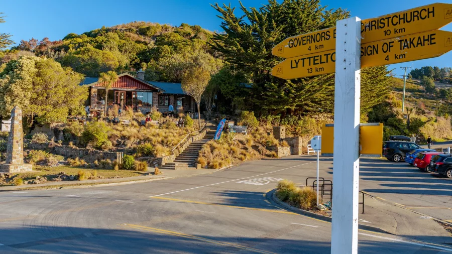 Historic Sign of the Kiwi café and track intersection on Summit Road