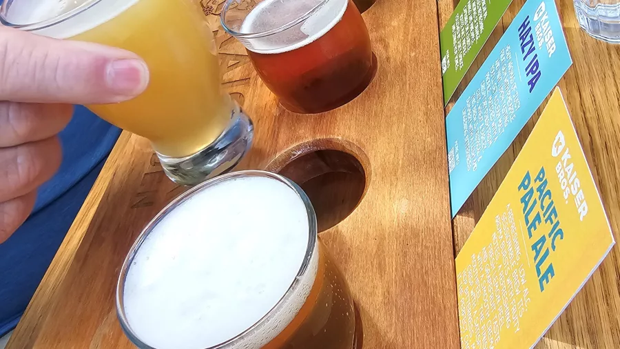 Craft beer tasting flight enjoyed by guests on a Christchurch city walking tour
