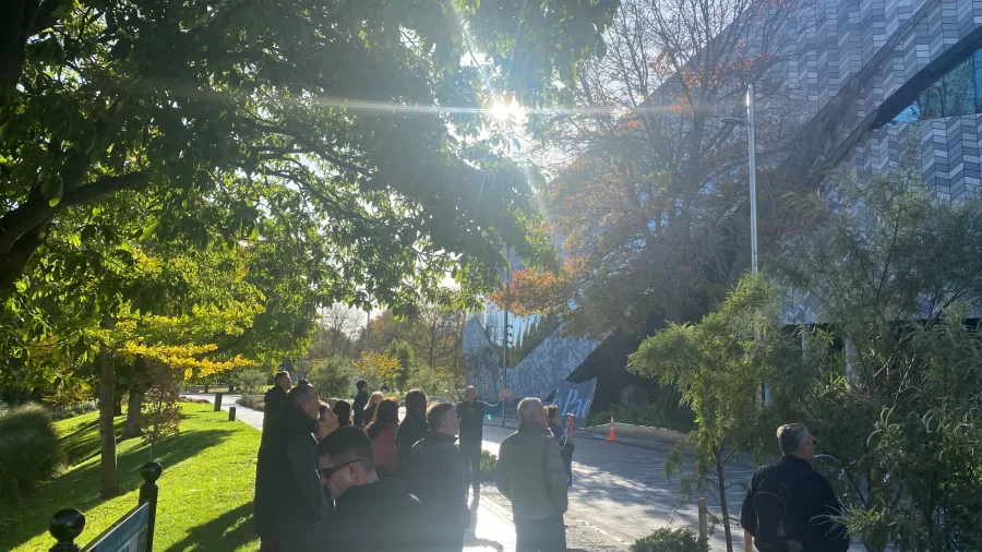 Group tour outside Te Pae Christchurch Convention Centre on a sunny morning