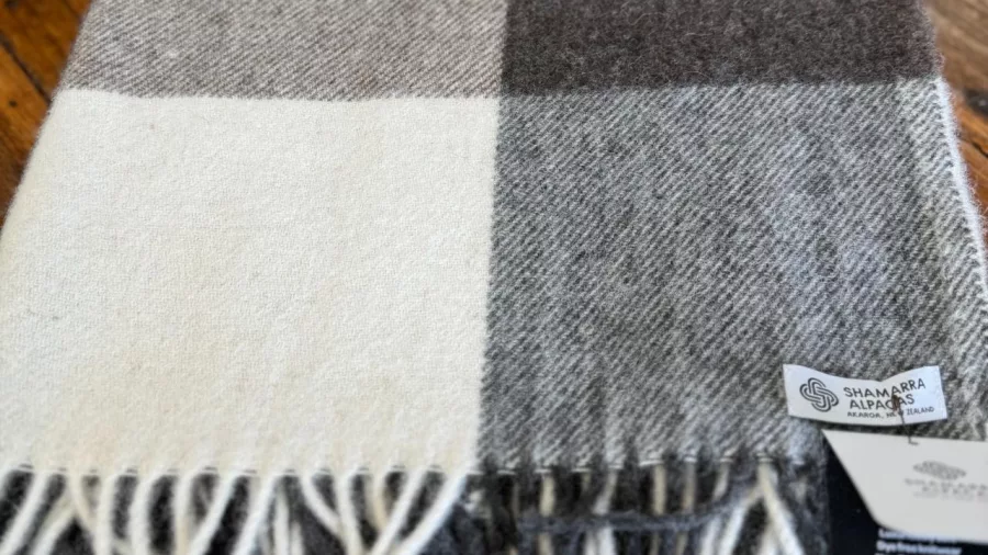 Soft alpaca wool throw in neutral tones from Shamarra Farm’s premium collection