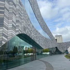 Te Pae Christchurch Convention Centre featuring a flowing tile façade inspired by Canterbury’s braided rivers.