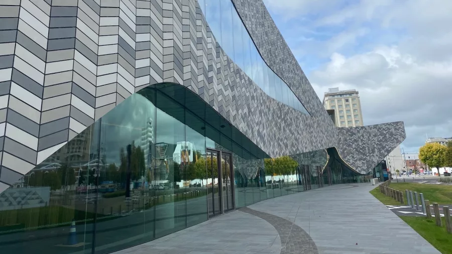 Te Pae Christchurch Convention Centre featuring a flowing tile façade inspired by Canterbury’s braided rivers.