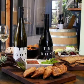 Wine and sharing platter at The Bone Line winery in Waipara Valley.